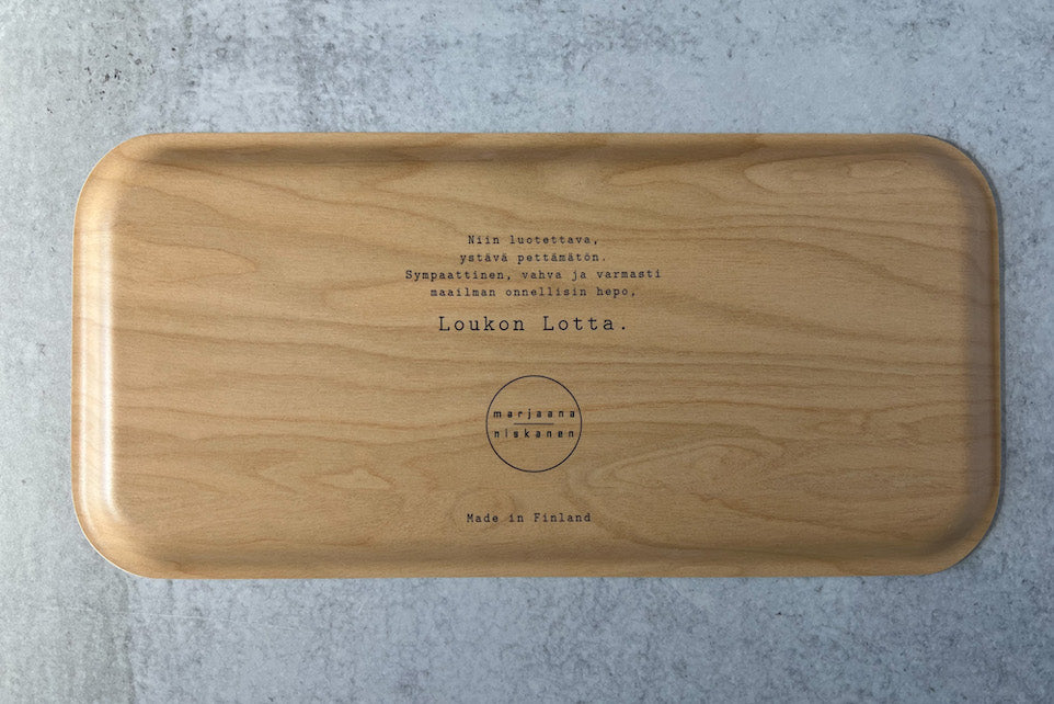 Bottom of tray colored of natural birch wood with Finnish text, Made in Finland