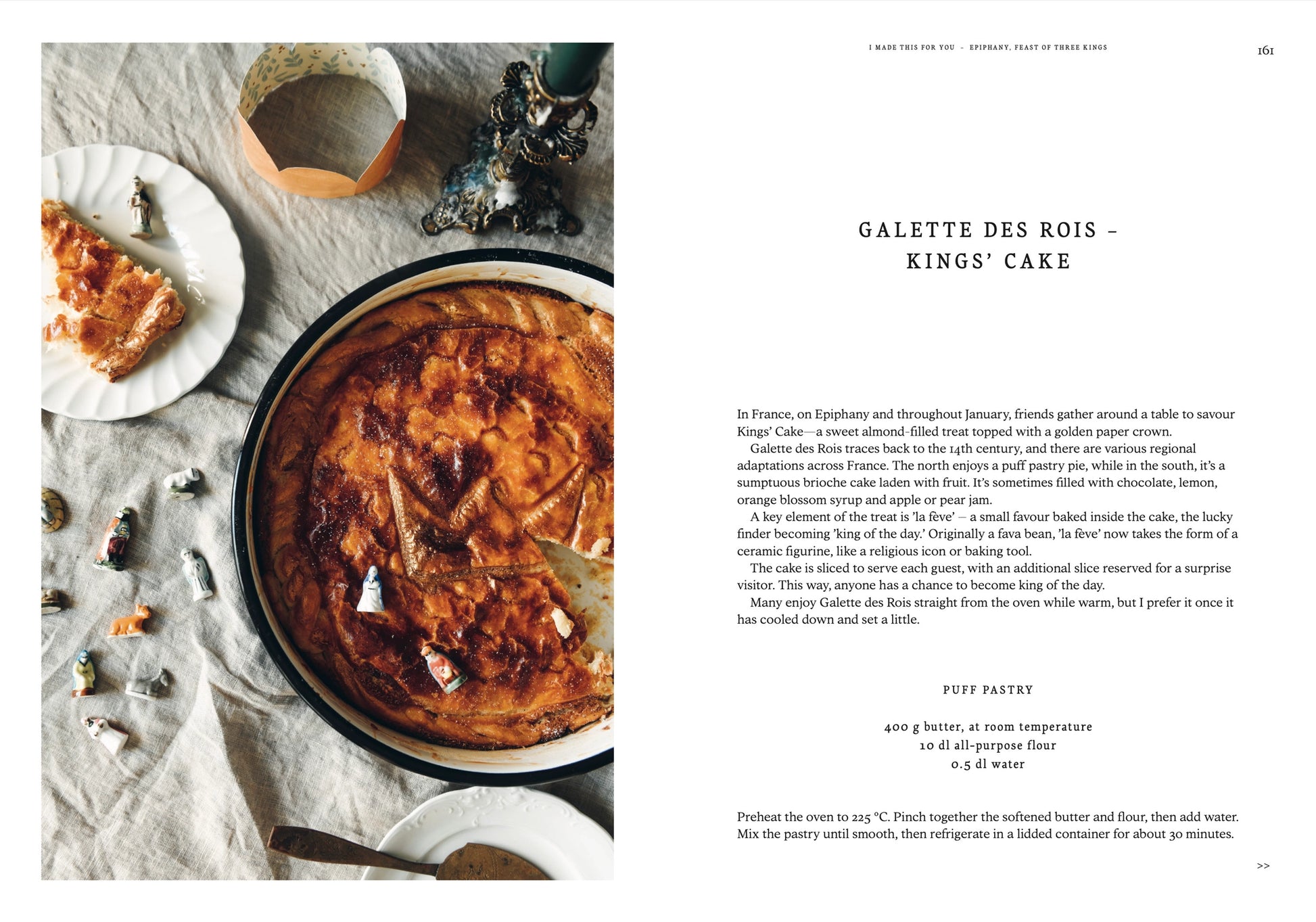 Galette des Rois (Kings' Cake) on a table with text of recipe on a separate page.