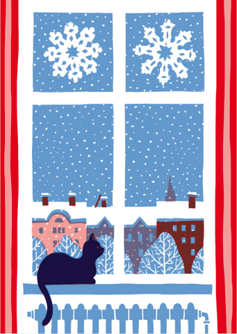 Cat laying in a window above a radiator with a winter scene and snowflakes outside.